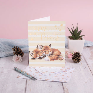  Wrendale Designs Little Wren Collection Blank New Parents Card artowkr features two fox cubs snuggled up together and it reads New Parents across the top in gold foil