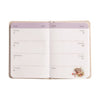 A 2027 mini pocket diary, featuring small illustrations by Hannah Dale. Under each date on each page, there is space to keep notes. Wrendale Designs.