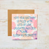 Rude but Funny Blank Birthday Card for Women; it features soft hues of peach, pink, and purple as a background. The text reads "Hope your birthday is filled with lots of love, laughter and cock *cake Bloody Autocorrect!"