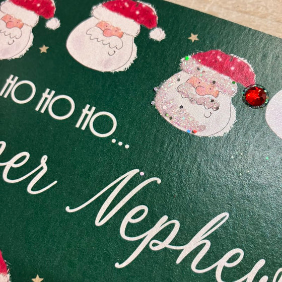 fun blank christmas card for nephew dancing santa heads Ho Ho Ho 1