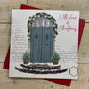 elegant cottage door christmas in the snow garlands and lights blank christmas card with love at Christmas