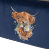 A brush bag with soft, velvet like fabric in the colour navy. This cosmetics bag features an embroidered highland cow 'Daisy Coo' designed by Hannah Dale. Wrendale Designs.