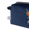 A brush bag with soft, velvet like fabric in the colour navy. This cosmetics bag features an embroidered highland cow 'Daisy Coo' designed by Hannah Dale. Wrendale Designs.