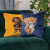 Daisy Coo, a beautifully embroidered cushion. Featuring a highland cow design on soft fabric that feels like velvet. Designed by Hannah Dale, this cushion is a perfect gift for animal lovers! Wrendale Designs.