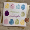 Blank Easter Card for young granddaughter; this card features beautiful pink, blue, green, and yellow easter eggs and the text reads "Happy Easter to a special Granddaughter"