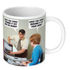 Funny woman's mug; featuring a man inpecting a womans computer, asking her 'have you tried turning it off and on again?'; the woman replies 'have you tried shoving it up your arse?'; by Dean Morris.