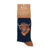 Highland heathers, a warm pair of high quality, navy bamboo socks for men. Designed by Hannah Dale, these socks feature a gorgrous artwork of a highland cow stitched into the soft fabric. A perfect gift for animal lovers. Wrendale Designs.