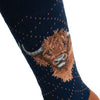 Highland heathers, a warm pair of high quality, navy bamboo socks for men. Designed by Hannah Dale, these socks feature a gorgrous artwork of a highland cow stitched into the soft fabric. A perfect gift for animal lovers. Wrendale Designs.