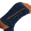 Highland heathers, a warm pair of high quality, navy bamboo socks for men. Designed by Hannah Dale, these socks feature a gorgrous artwork of a highland cow stitched into the soft fabric. A perfect gift for animal lovers. Wrendale Designs.