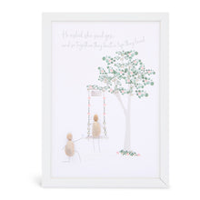  This white shadowbox framed pebble art A4 print features a person swinging on a swing under a tree and another on bent knew proposing.&nbsp; It reads He asked she said yes... and so together they built a life the loved.

This would be a great gift for an engagement, wedding, or an anniversary.