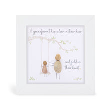  These small white shadow box frame gifts are made with a 4-inch white shadow box frame with a plexiglass insert, helping it be less fragile in the post and around the home. You can also easily take them apart to clean the inside of the glass or frame if you need to. They come individually boxed for added protection during shipping.

This white shadowbox framed pebble art features an adult pushing a child on a swing. It reads A grandparent has silver in their hair and gold in their heart