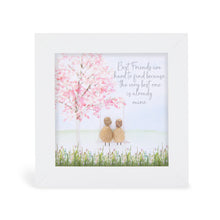  These small white shadow box frame gifts are made with a 4-inch white shadow box frame with a plexiglass insert, helping it be less fragile in the post and around the home. You can also easily take them apart to clean the inside of the glass or frame if you need to.&nbsp; They come individually boxed for added protection during shipping.&nbsp;

This white shadowbox framed pebble art print 2 people sitting under a tree. It reads Best friends are hard to find because the very best one is already mine.