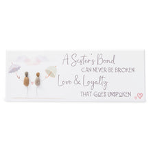  This beautiful wood plaque depicts 2 women walking with their umbrellas and it reads A sister’s bond can never be broken. Love &amp; loyalty that goes unspoken.