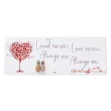  These wood plaques have all been painted white prior to their individual designs being painted on with the pebble art. They measure 32cm (L) x 12cm (W) x 1cm (D) and can be hung on the wall if desired.&nbsp;

This beautiful wood plaque depicts 2 people sitting on a heart shaped tree under a tree and it reads Loved you once Love You Still Always Have Always Will