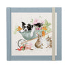 A beautiful, rustic, farmland password book. Centering a beautiful illustration by Wrendale Designs. A farm dog sleeping in a wheelbarrow of crops. 2 Sneaky rabbits, nibbling on some carrots from the wheelbarrow. A perfect gift.