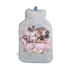 A medium-sized hot water bottle, wrapped in a cozy and incredibly soft light grey cover. Featuring beautiful dog watercolor illustrations by Hannah Dale. A perfect gift for dog lovers, by Wrendale Designs.