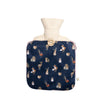 A medium-sized hot water bottle, wrapped in a cozy and super-soft navy fabric, featuring a giant fox and other small woodland creatures, all designed by Hannah Dale for Wrendale Designs; a perfect gift for animal lovers.