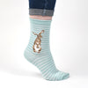 Hare and the bee, a warm pair of high quality, blue and white striped bamboo socks for women. Featuring a gorgeous artwork by Hannah Dale, of an adorable hare stood on its back legs, stitched into the soft fabric. A perfect gift for animal lovers. Wrendale Designs.