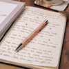 Women's black ink, ballpoint pen. Featuring a pastel pink barrel dotted with gorgeous giraffe illustrations by Hannah Dale. A gift for giraffe lovers. Wrendale Designs.